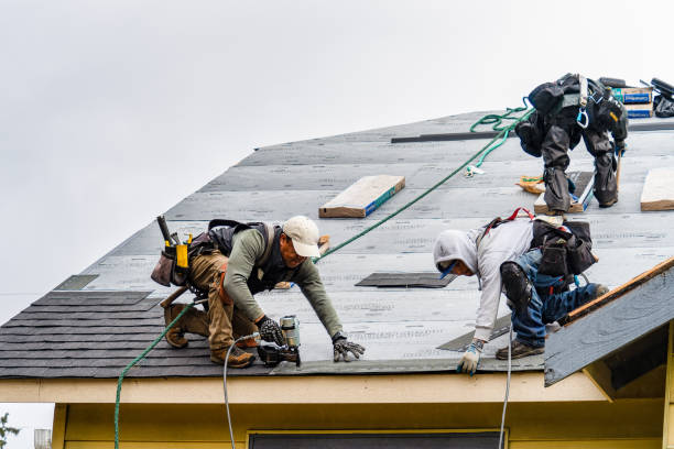 Professional Roofing technician working in North Scituate, RI